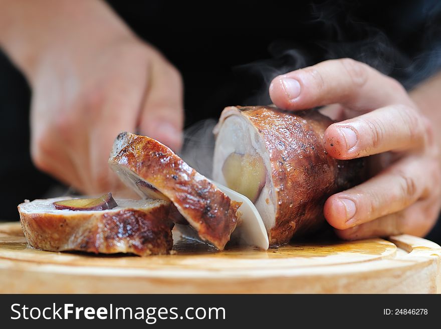 Stuffed rabbit filled with plums, fried in butter and then roasted in the oven