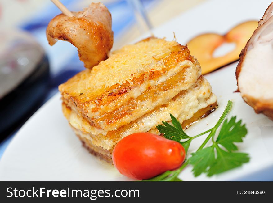 Square potatoes fried in oven with cheese and cream