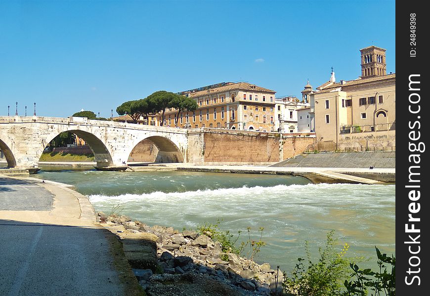 Small waterfall on tiber river in Rome