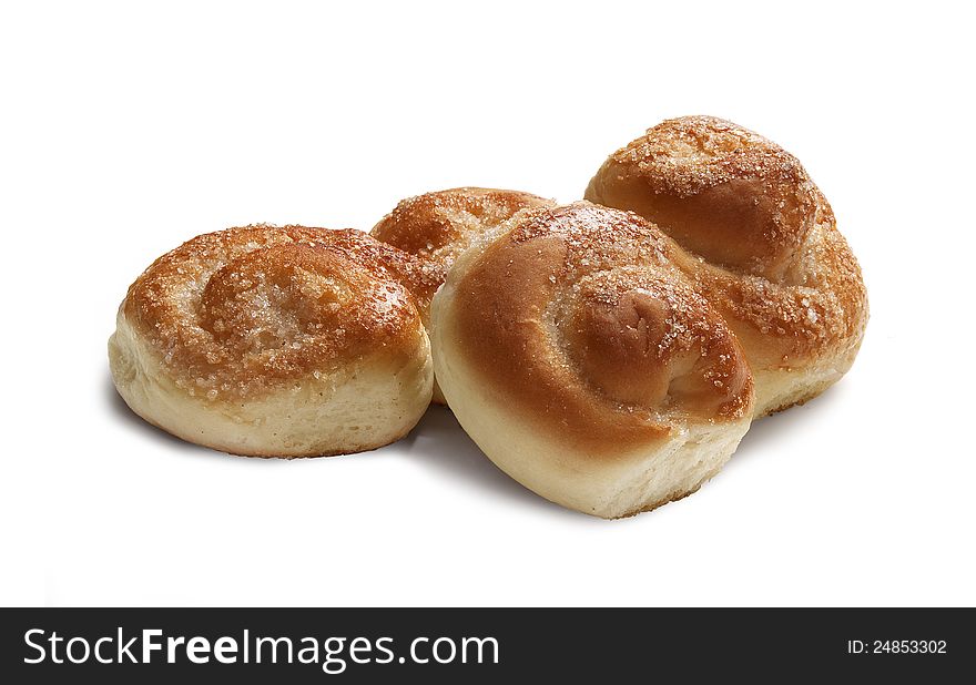Two fresh sugar buns on the white background. Two fresh sugar buns on the white background