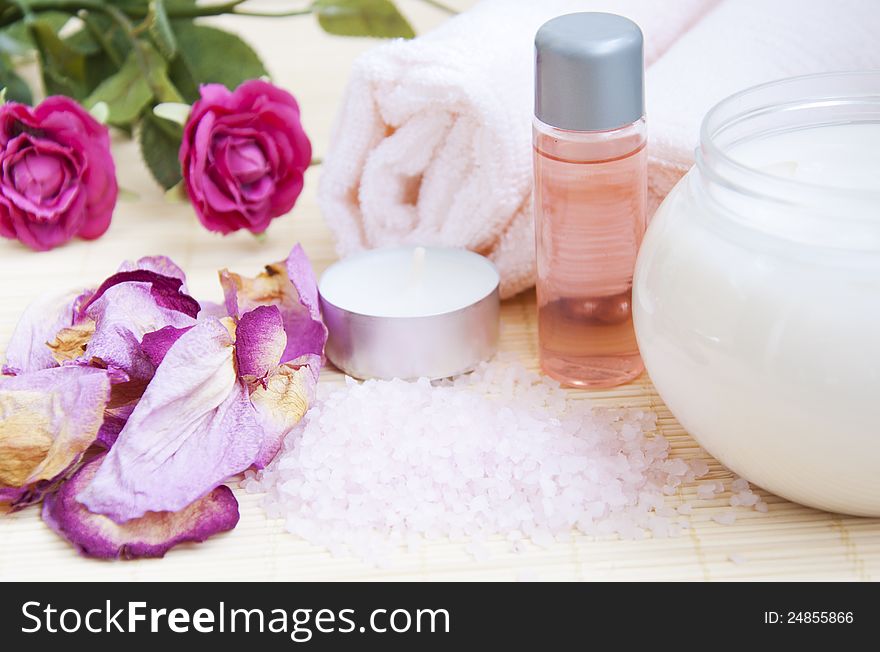 Aromatic rose petals, bath salt,  body oil and candle. Aromatic rose petals, bath salt,  body oil and candle