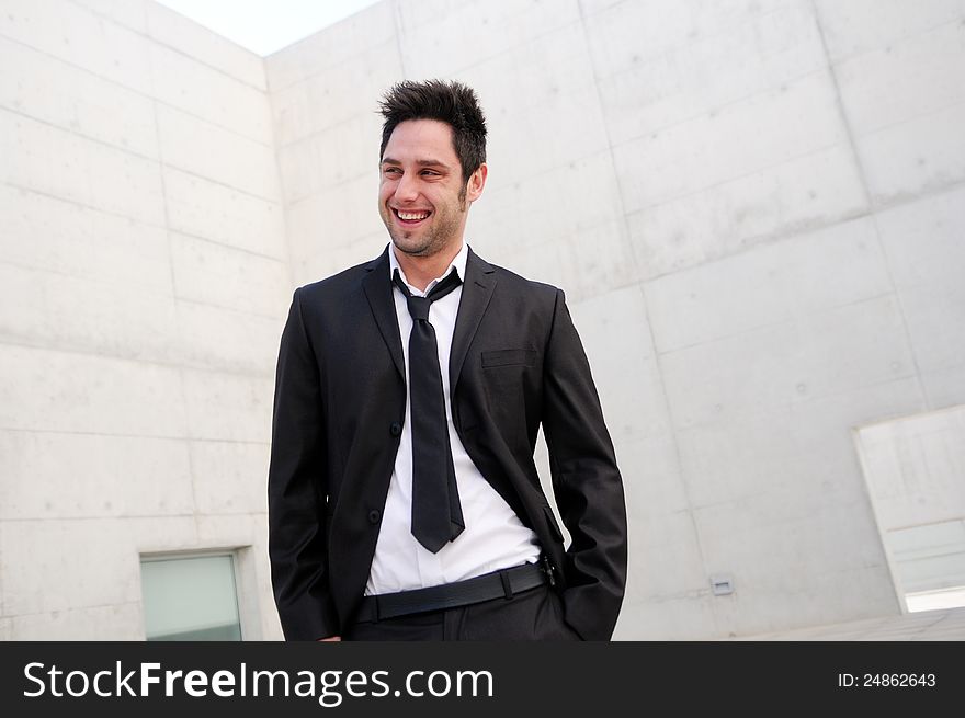 Portrait of a handsome young business man smiling