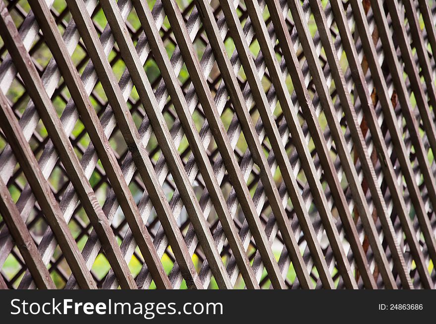 Wooden lattice fence, background, texture. Wooden lattice fence, background, texture