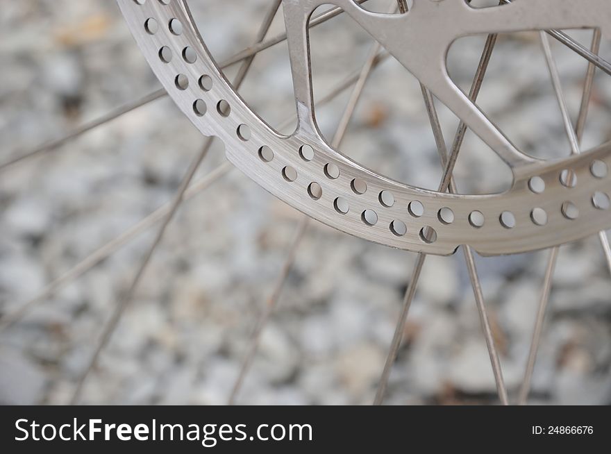 Closeup of bike wheel with brake disk. Closeup of bike wheel with brake disk