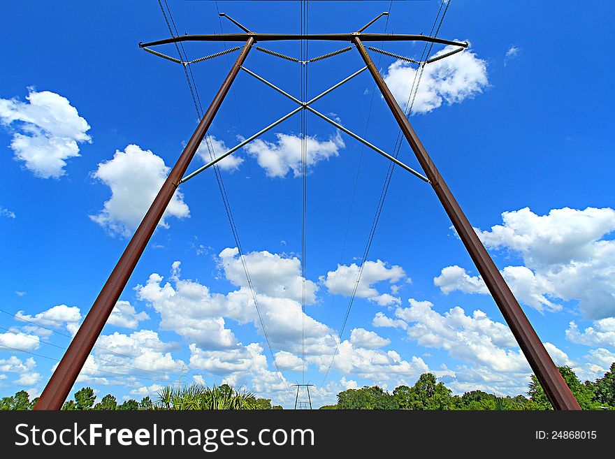 A wide-angle shot of high voltage, high tension electrical lines
