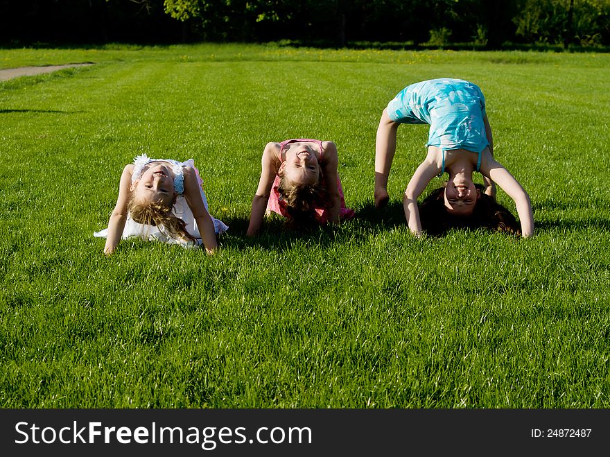 Three Girls Doing Exercises, In Nature