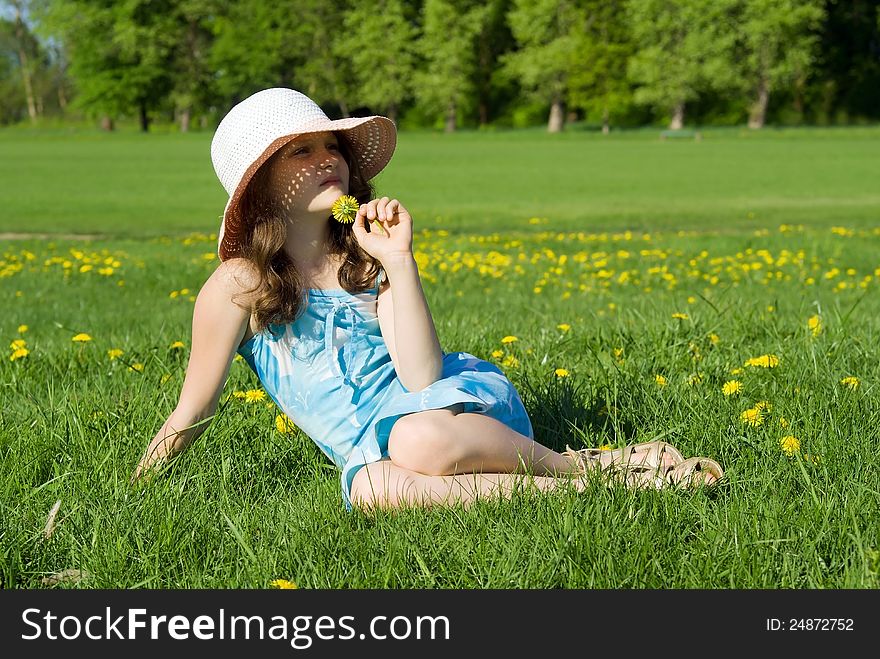 Girl Resting In The Meadow