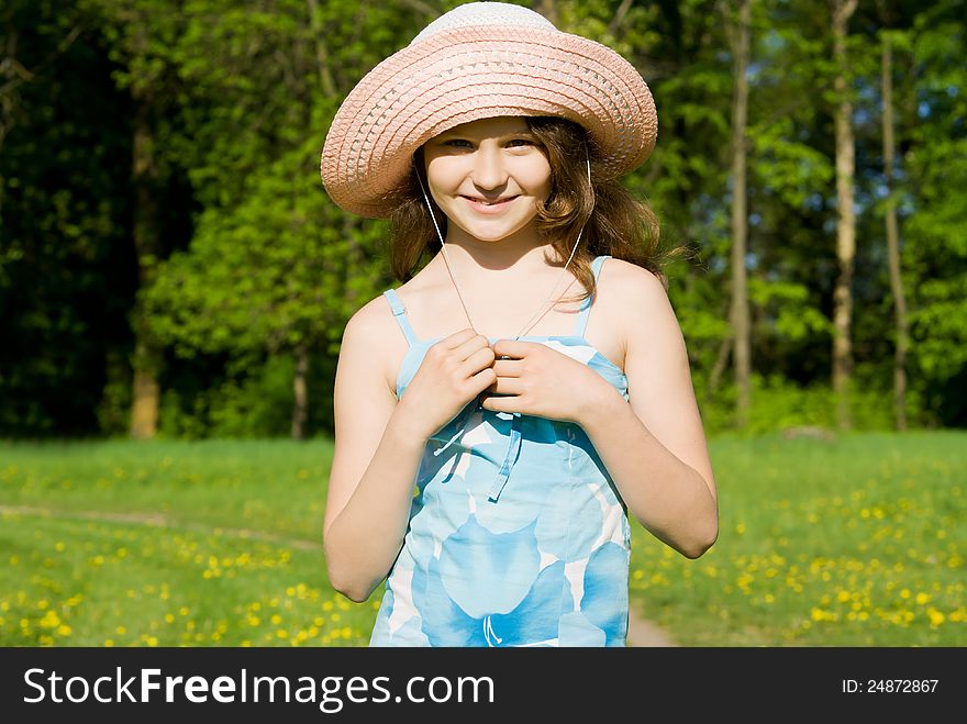 Beautiful girl standing in the field, in nature. Beautiful girl standing in the field, in nature