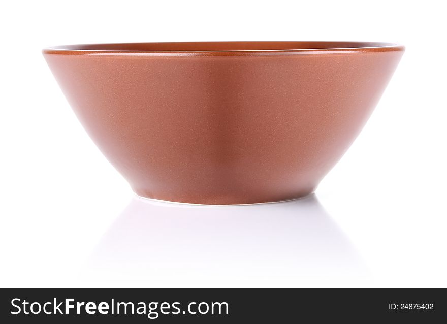 Brown ceramic plate on white background