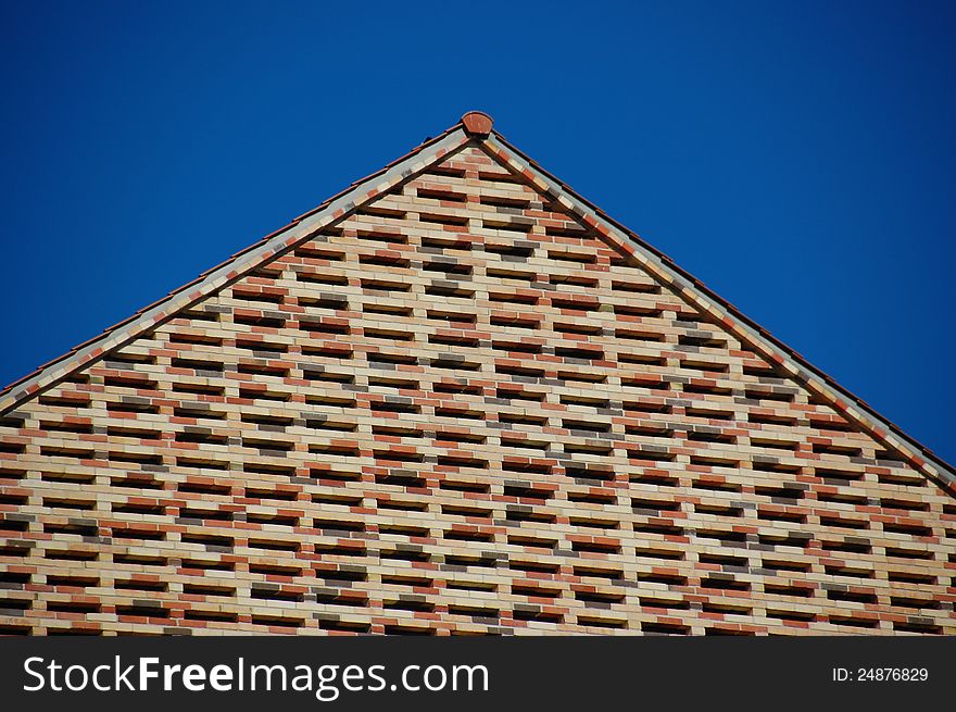 Brick Facade Against Blue Sky