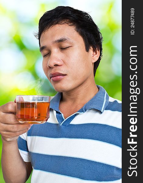 Man with Glass of Tea in the Morning