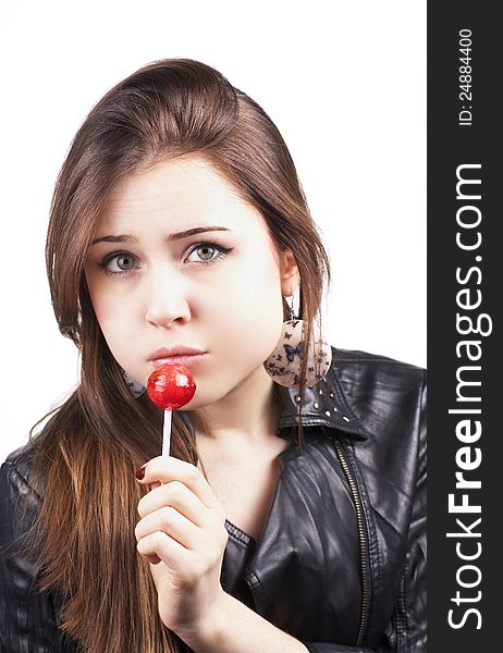 Licking lollipop woman on white