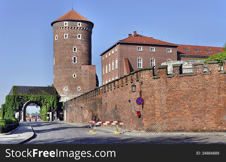 Medieval gothic Sandomierska Tower, defensive wall and entrance gate of royal Wawel Castle in Krakow (Cracow), Poland. Medieval gothic Sandomierska Tower, defensive wall and entrance gate of royal Wawel Castle in Krakow (Cracow), Poland