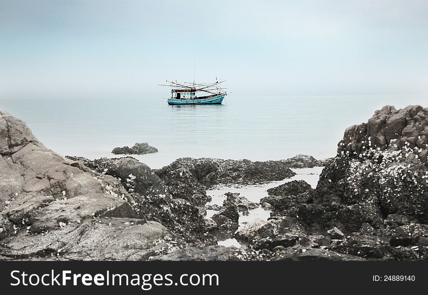 The fishing boat in the sea