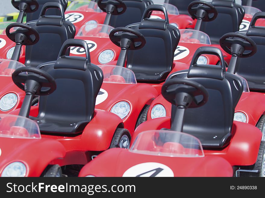 Red toy race cars for kids.