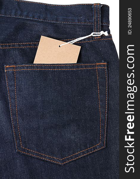 Blank brown tag with rope attached to blue jeans. Blank brown tag with rope attached to blue jeans.