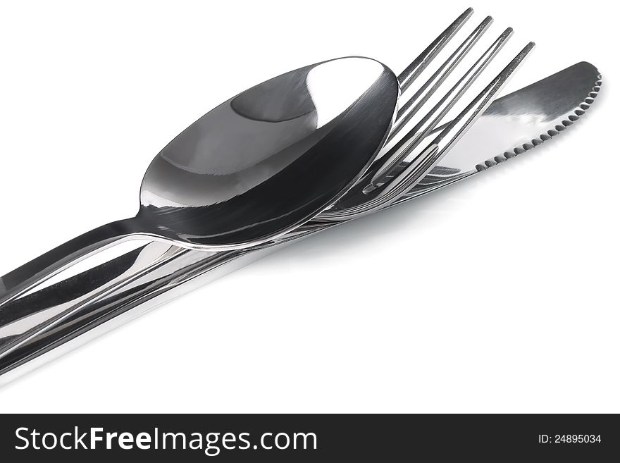 Cutlery - a spoon, fork and knife stacked up