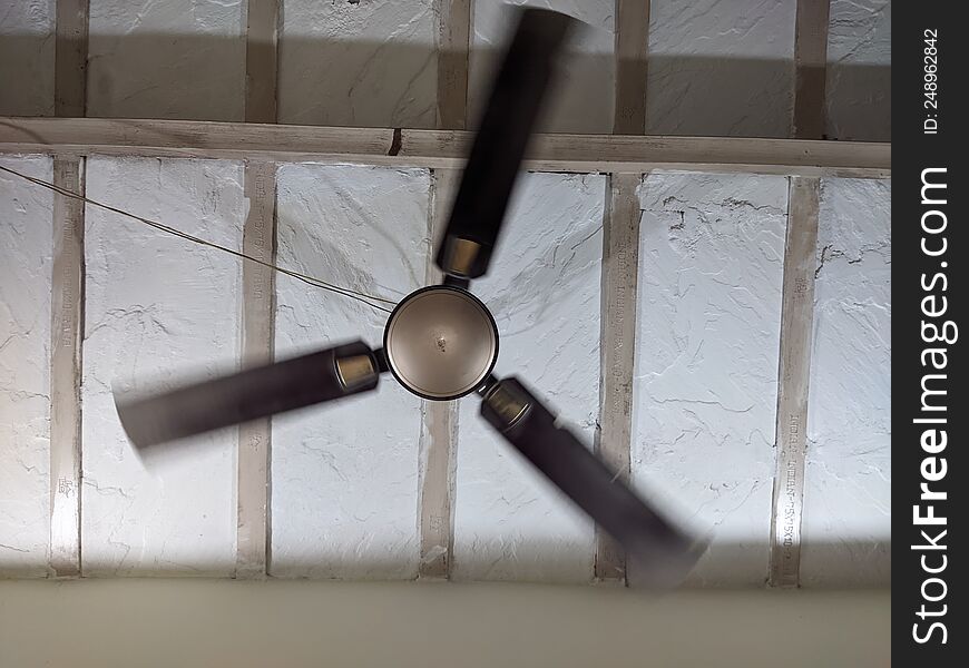 A Ceiling Fan Moving With Medium Speed