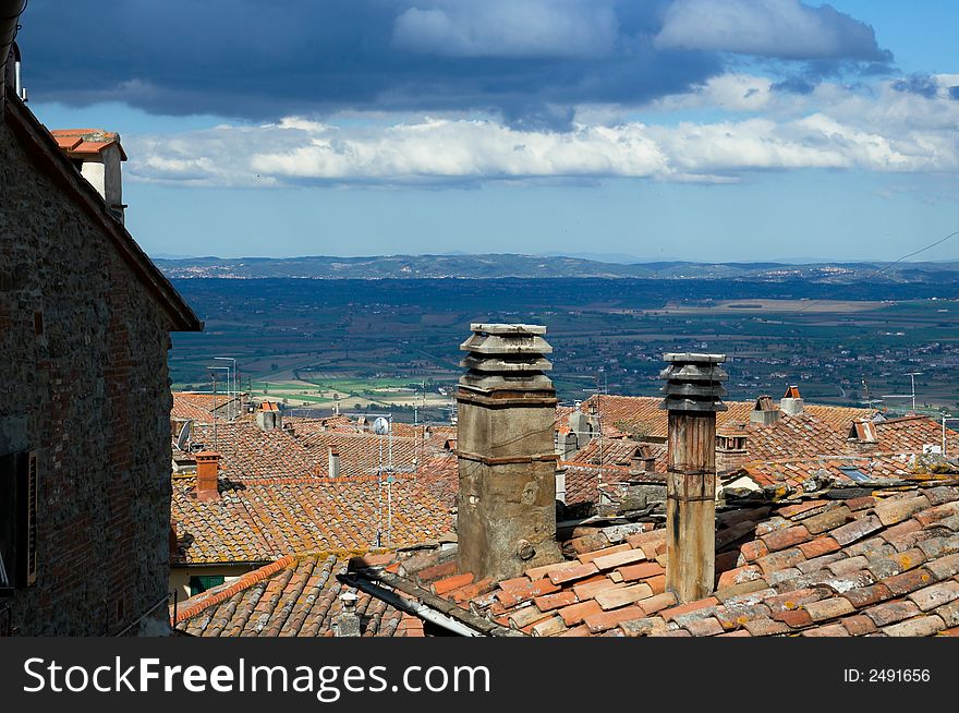 Roofs and chimneys of Cortona, Tuscany region of  Italy. Roofs and chimneys of Cortona, Tuscany region of  Italy.