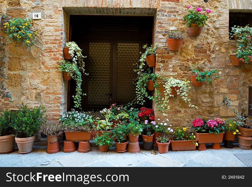 Walls and flowers in villages in Tuscany region of Italy. Walls and flowers in villages in Tuscany region of Italy.