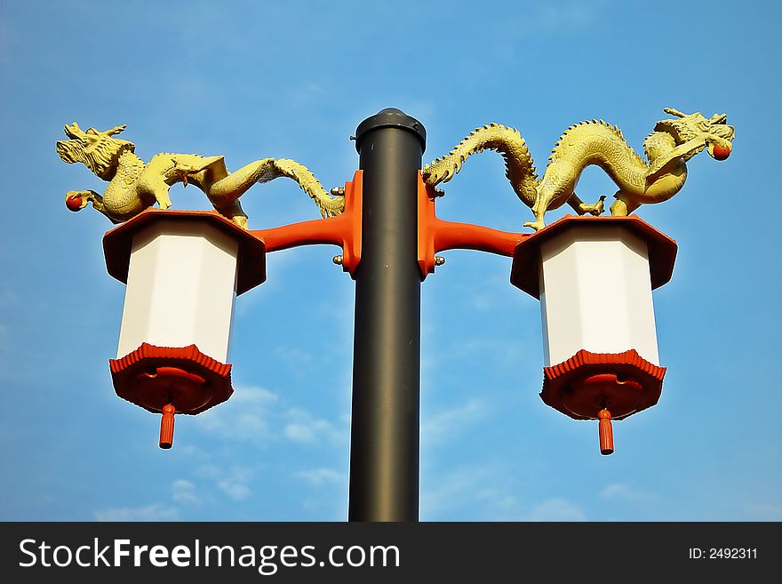 Traditional Chinese street lamp with dragons from Chicago\'s China Town. Traditional Chinese street lamp with dragons from Chicago\'s China Town