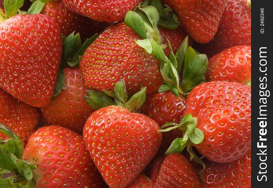 Photo of a pile of ripe strawberries