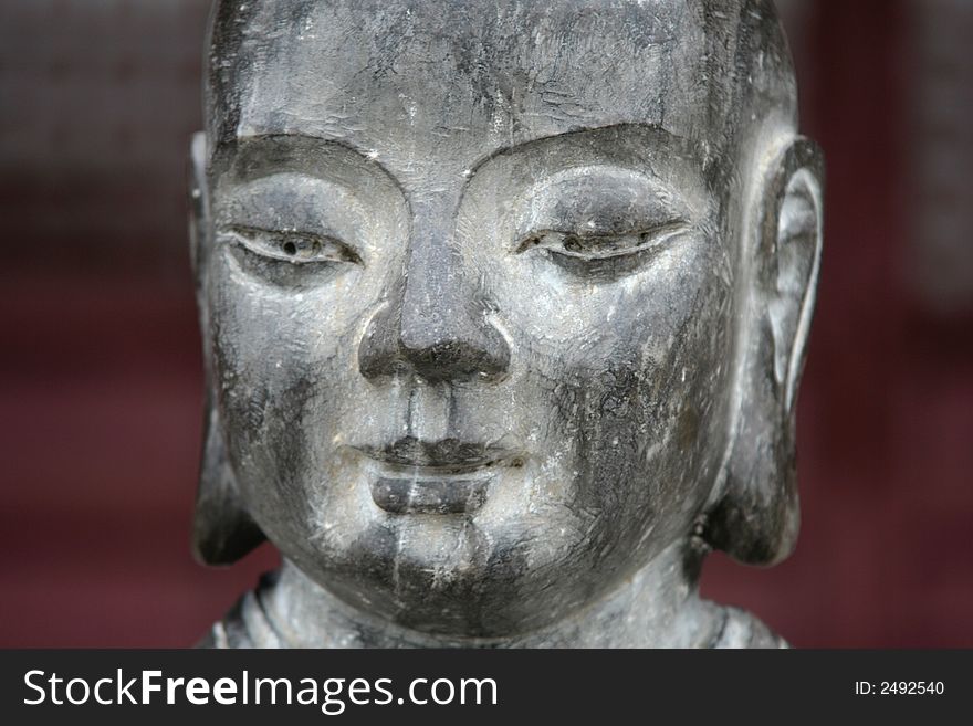 Ancient chinese Buddha statue in Suzhou's Pan Men City Gate (near Shanghai) . Ancient chinese Buddha statue in Suzhou's Pan Men City Gate (near Shanghai)