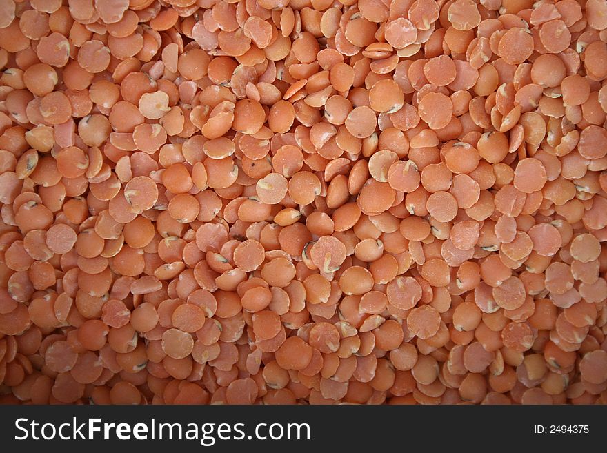 Dried red split lentils in profusion