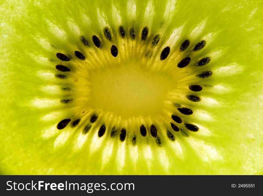 Close-up of a kiwi fruit and its seeds