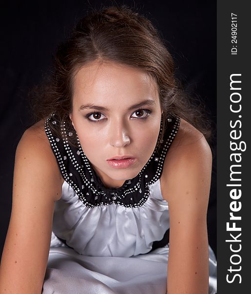 Romantic young caucasian woman on black background. Romantic young caucasian woman on black background