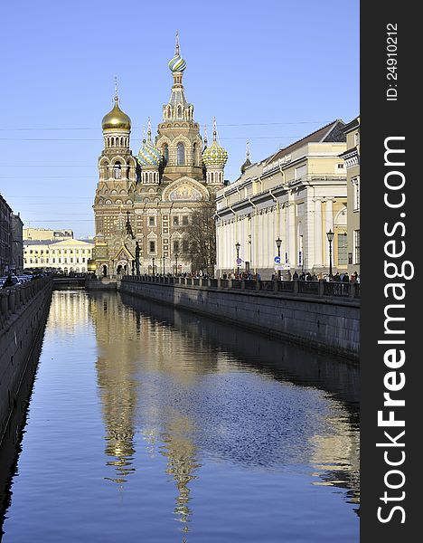 Day view over water channel to the famous orthodox Church of Our Savior on Spilled Blood, called Spas-na-Krovi on Russian in St.Petersburg. Day view over water channel to the famous orthodox Church of Our Savior on Spilled Blood, called Spas-na-Krovi on Russian in St.Petersburg