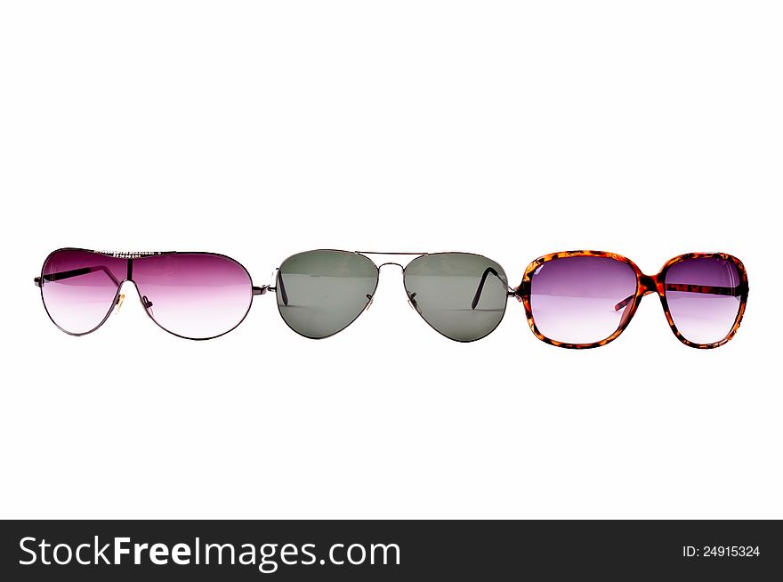 Three pair of sunglasses isolated on white