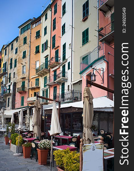 The colorful seafront of Portovenere, Italy with the seafood restaurants overlooking the marina