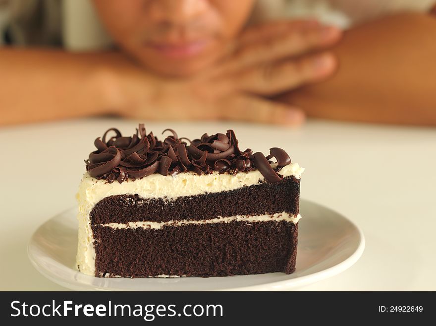 The man and  chocolate cake