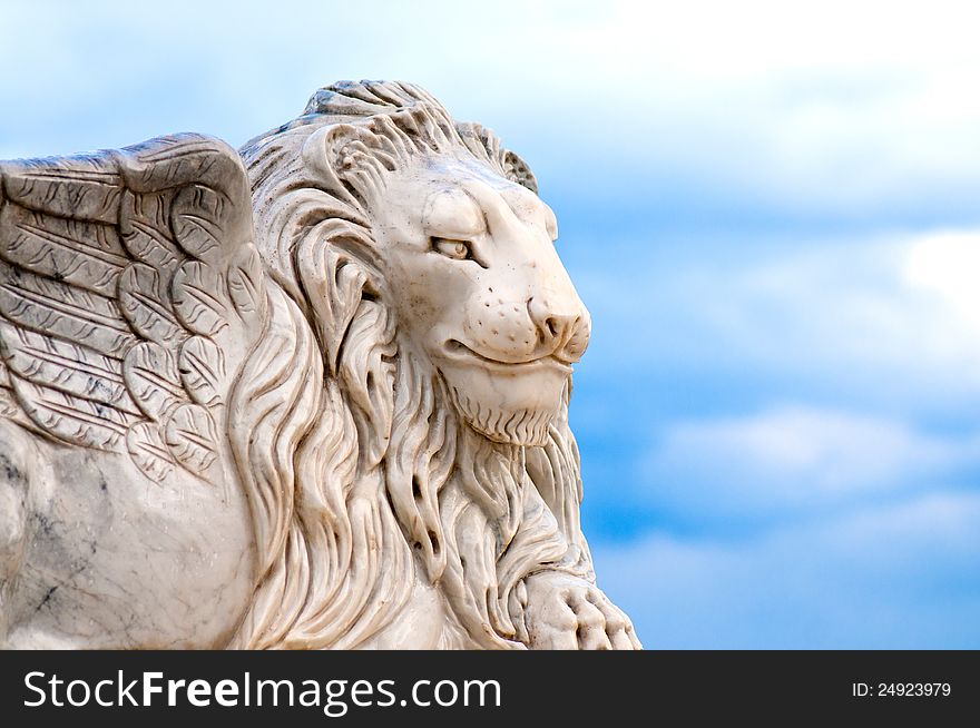 Winged lion head, detail of antique statue