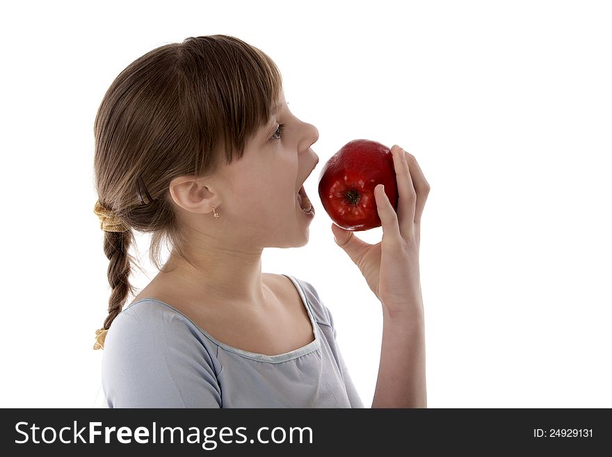 Image of the girl eating an apple. Image of the girl eating an apple