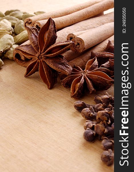 Various spices on the wooden board