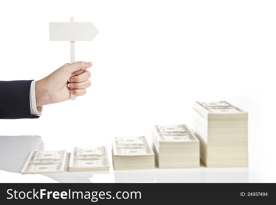 Woman hand holding arrow sign against white background. Woman hand holding arrow sign against white background