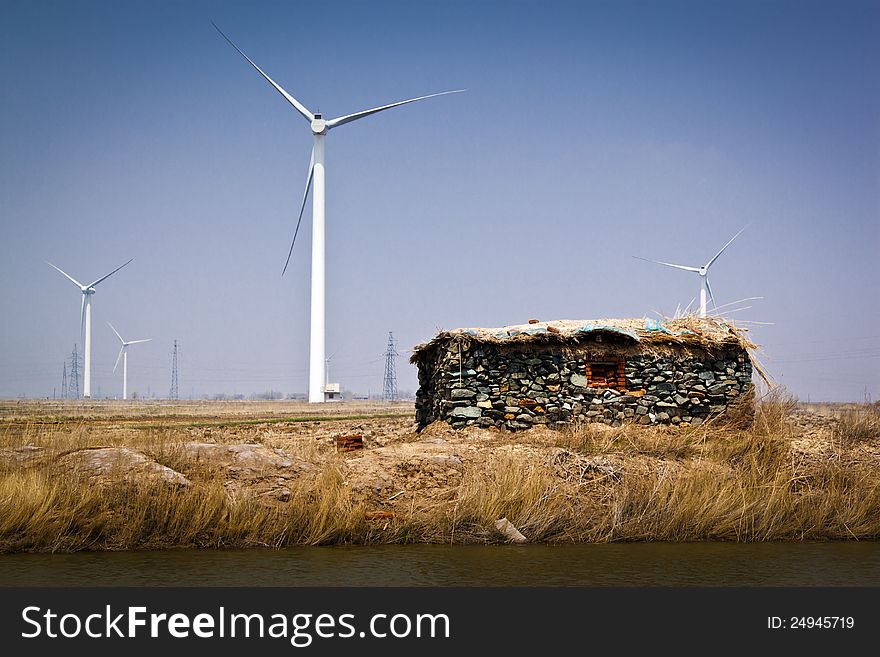 A stone shed by the riverside.