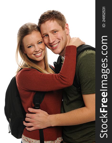 Young students couple smiling isolated on a white background