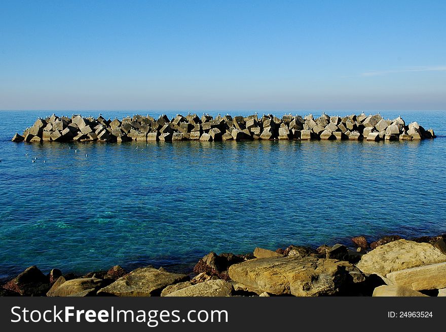 Sea landscape in Italy with roks in sunny day. Sea landscape in Italy with roks in sunny day