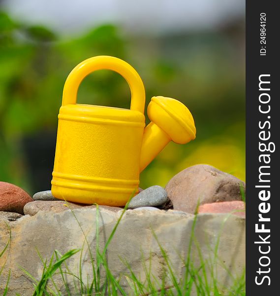 Kids’ Watering Can in the Garden