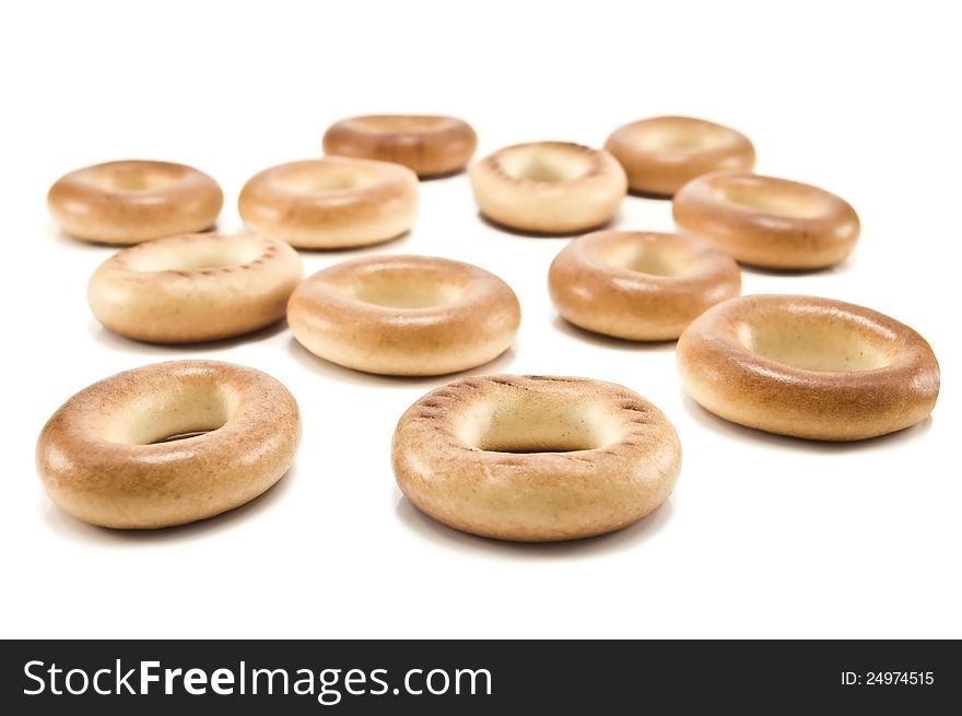Delicious bagels on white background