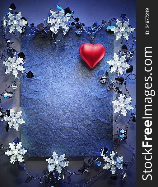 Blue paper bordering with christmas decoration. Blue paper bordering with christmas decoration