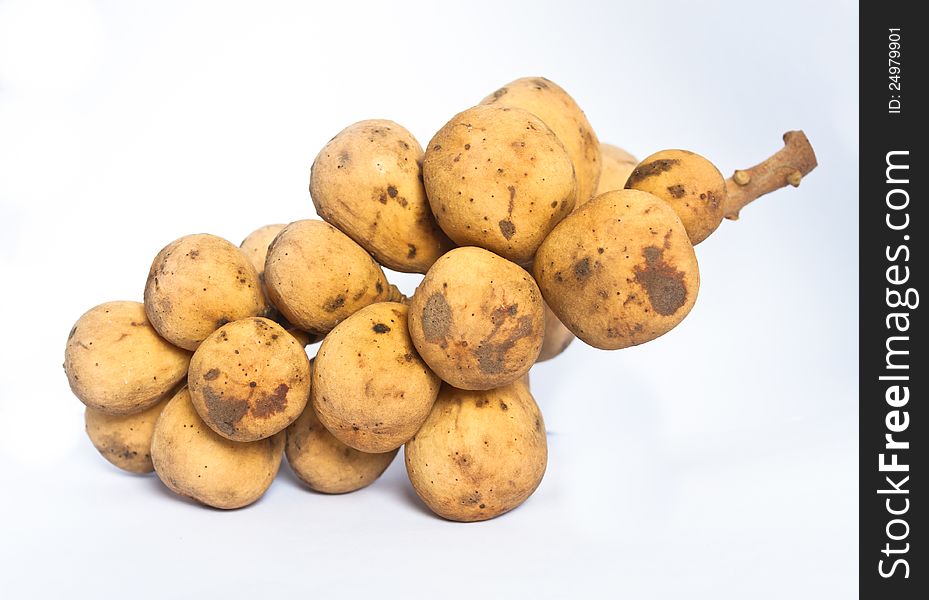 Isolated macro image of the tropical Langsat fruit (Lansium domesticum).