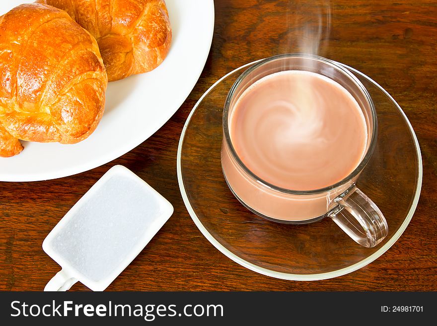 Breakfast set include Croisant with Hot tea cup