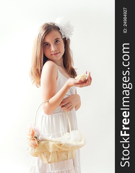 Beautiful young girl with basket