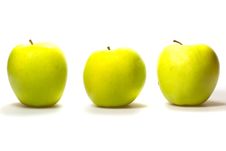 Three Yellow-green Apples On White Background. Royalty Free Stock Photo