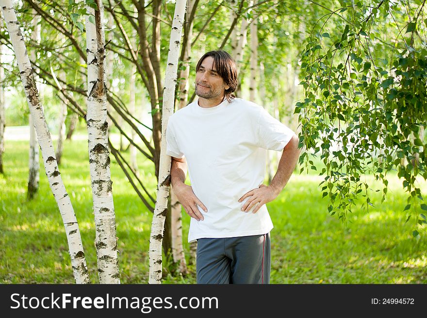 Middle-aged man in a park. Middle-aged man in a park