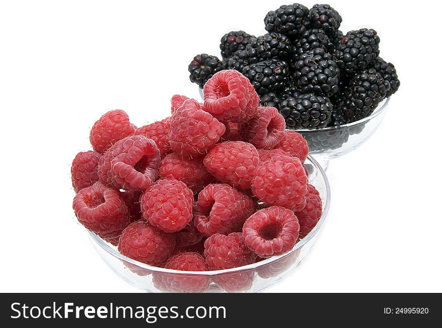 Raspberry on white background in the restaurant. Raspberry on white background in the restaurant